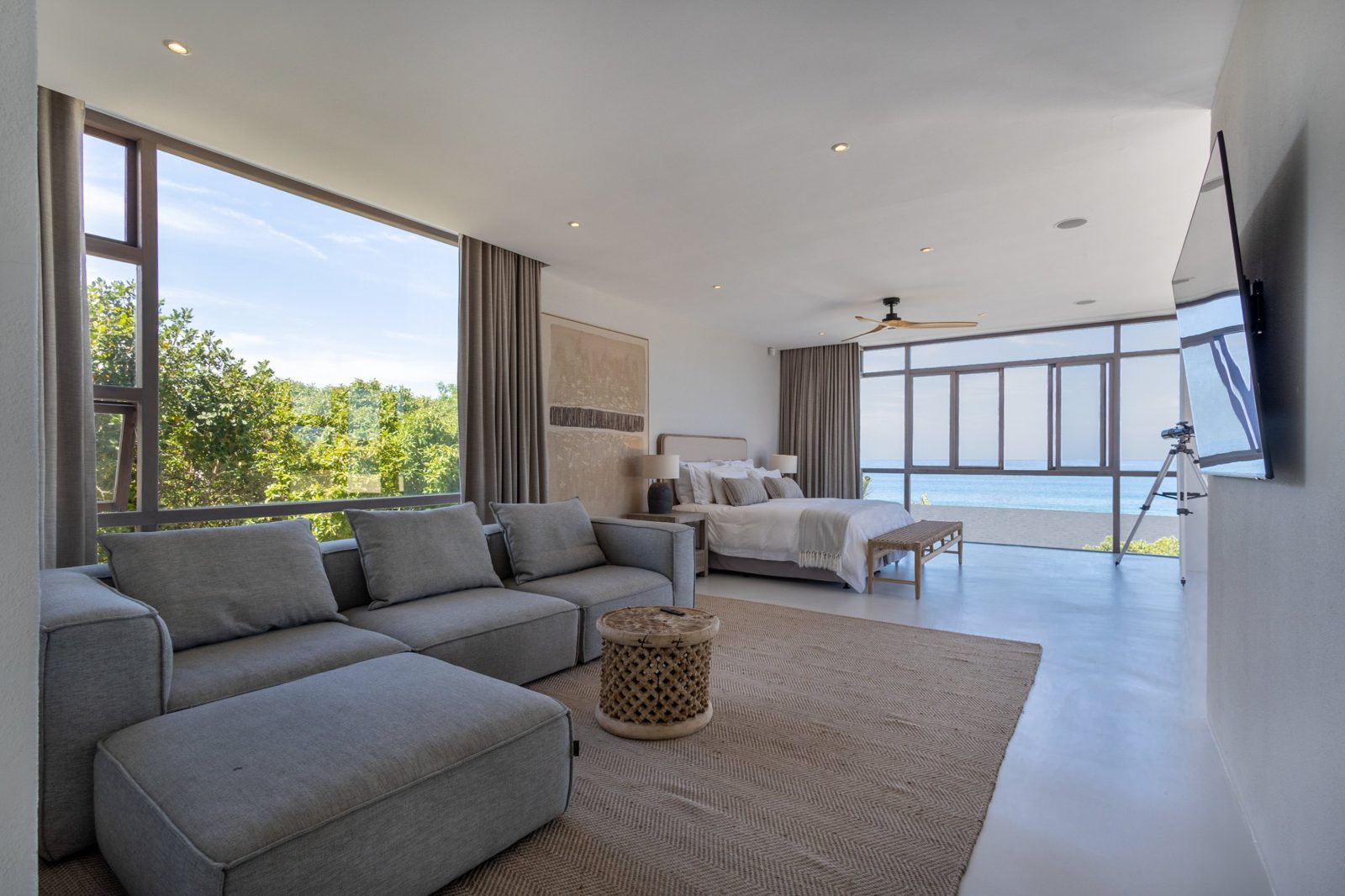 Main suite with a lounge area and ocean views